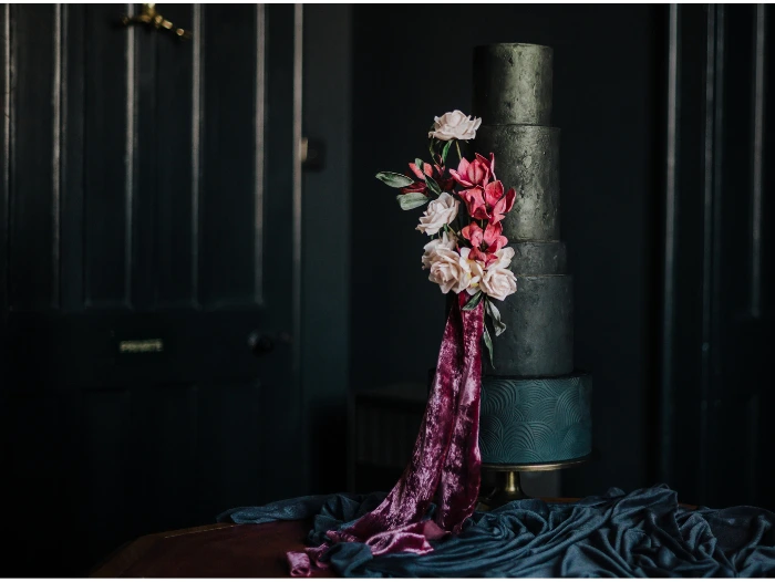 Modern black textured wedding cake to help conjure up excitement for a wedding cake journey