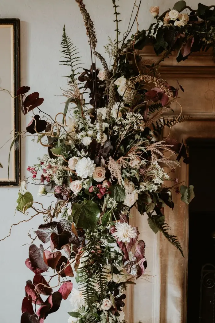 Modern autumn wedding flower fireplace display