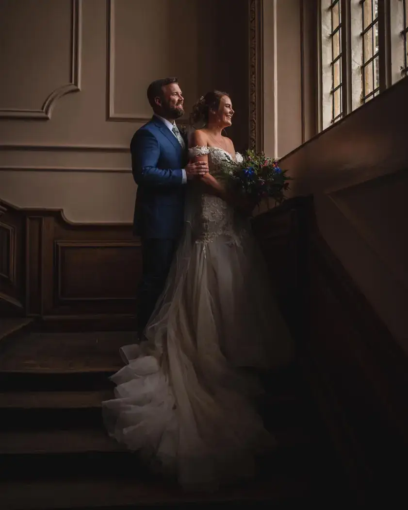 warn moody toned wedding couple image
