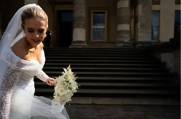 Contemporary bride Surrey Bride captured beautifully on the stairs