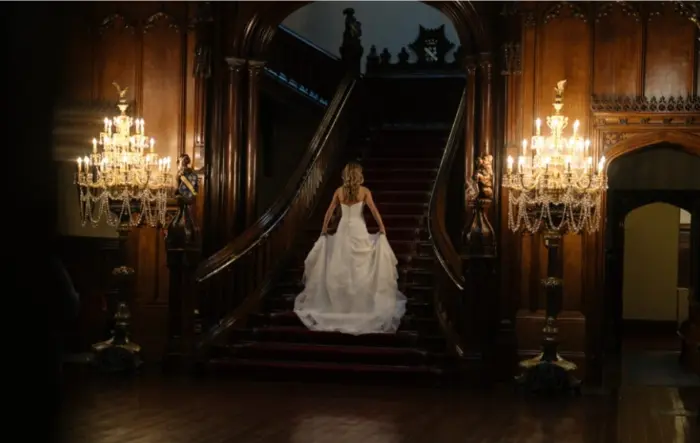 Bride on staircase wedding shot surrey photographer