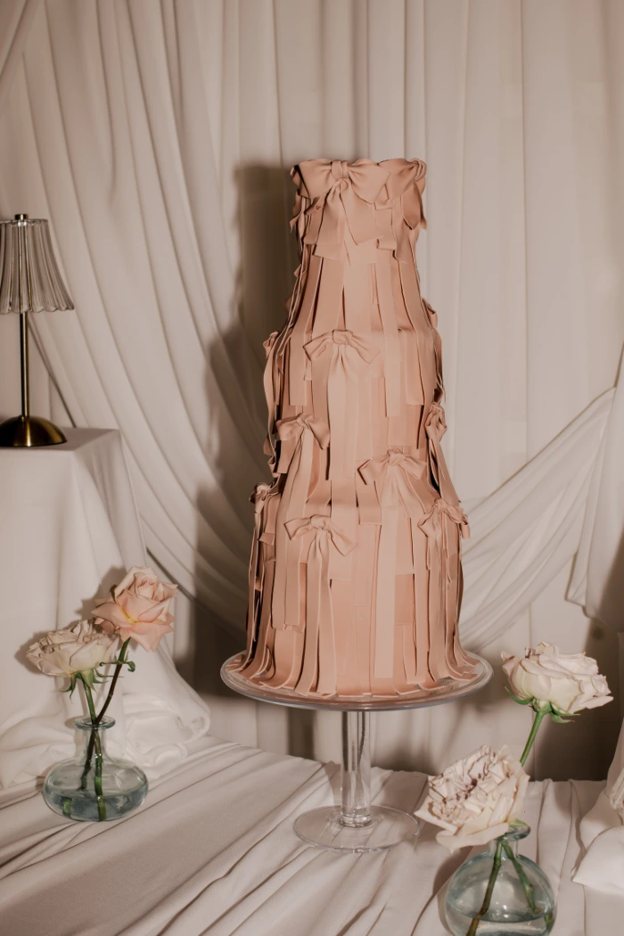 Contemporary and romantic layered ribbon and bow wedding cake Hirst Priory Doncaster
