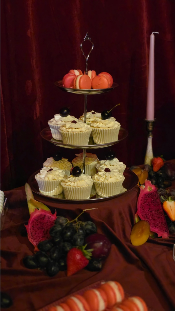 Ruffle buttercream cupcakes as part of a wedding dessert table at Wilderness Reserve, Suffolk